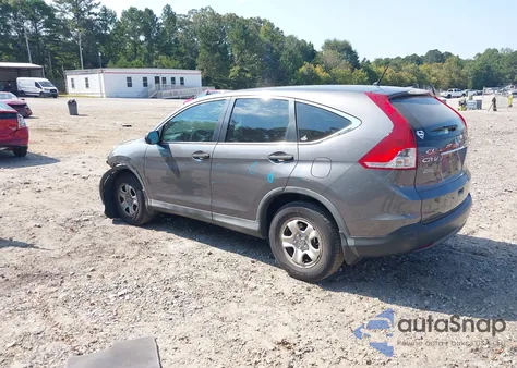 2014 Honda Cr-V Lx z USA, uszkodzony, nr VIN 2HKRM3H32EH517841